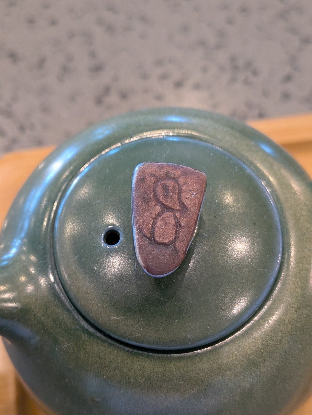 Green Ceramic Teapot with Brown Handle Accent - Dainty and Functional
